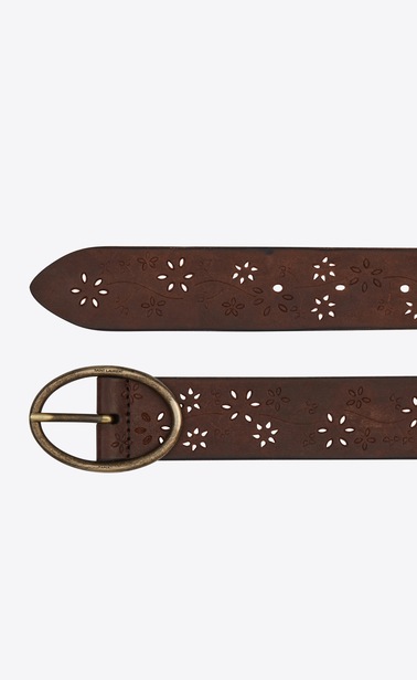 Belt with oval buckle in perforated raw leather